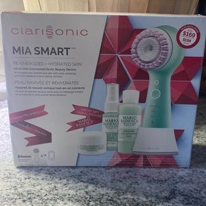 Never opened Clarisonic with stand & Mario Badescu Products